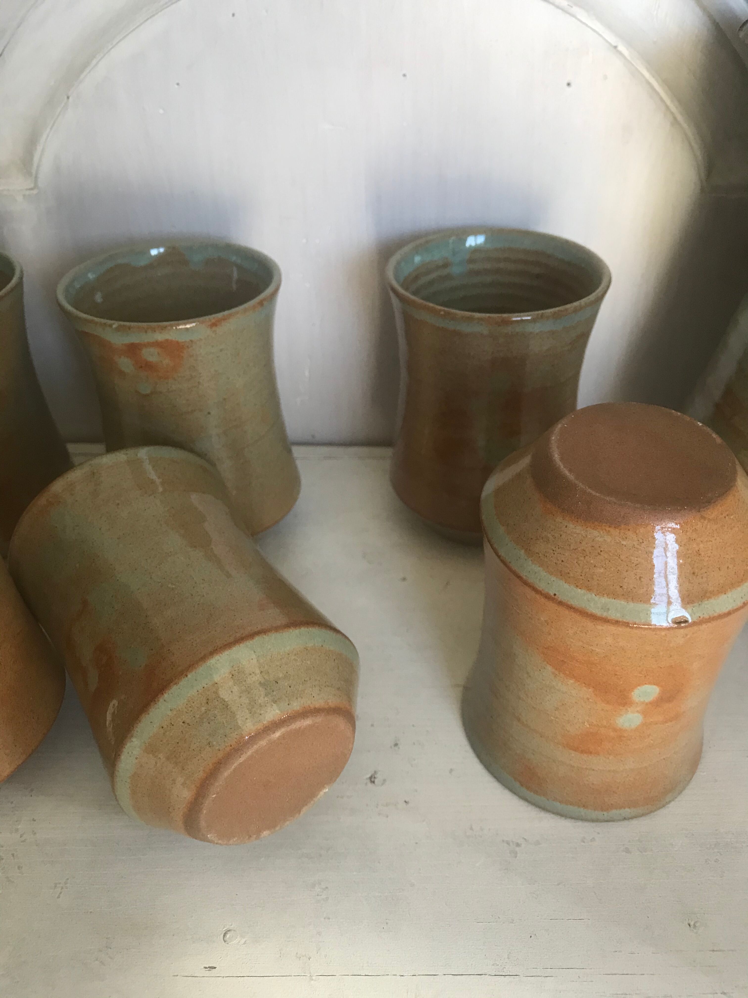 Pitcher and its vintage sandstone glasses