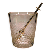 Vintage crystal ice bucket with gold tongs.