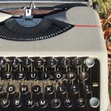 Hermes Baby typewriter with bag