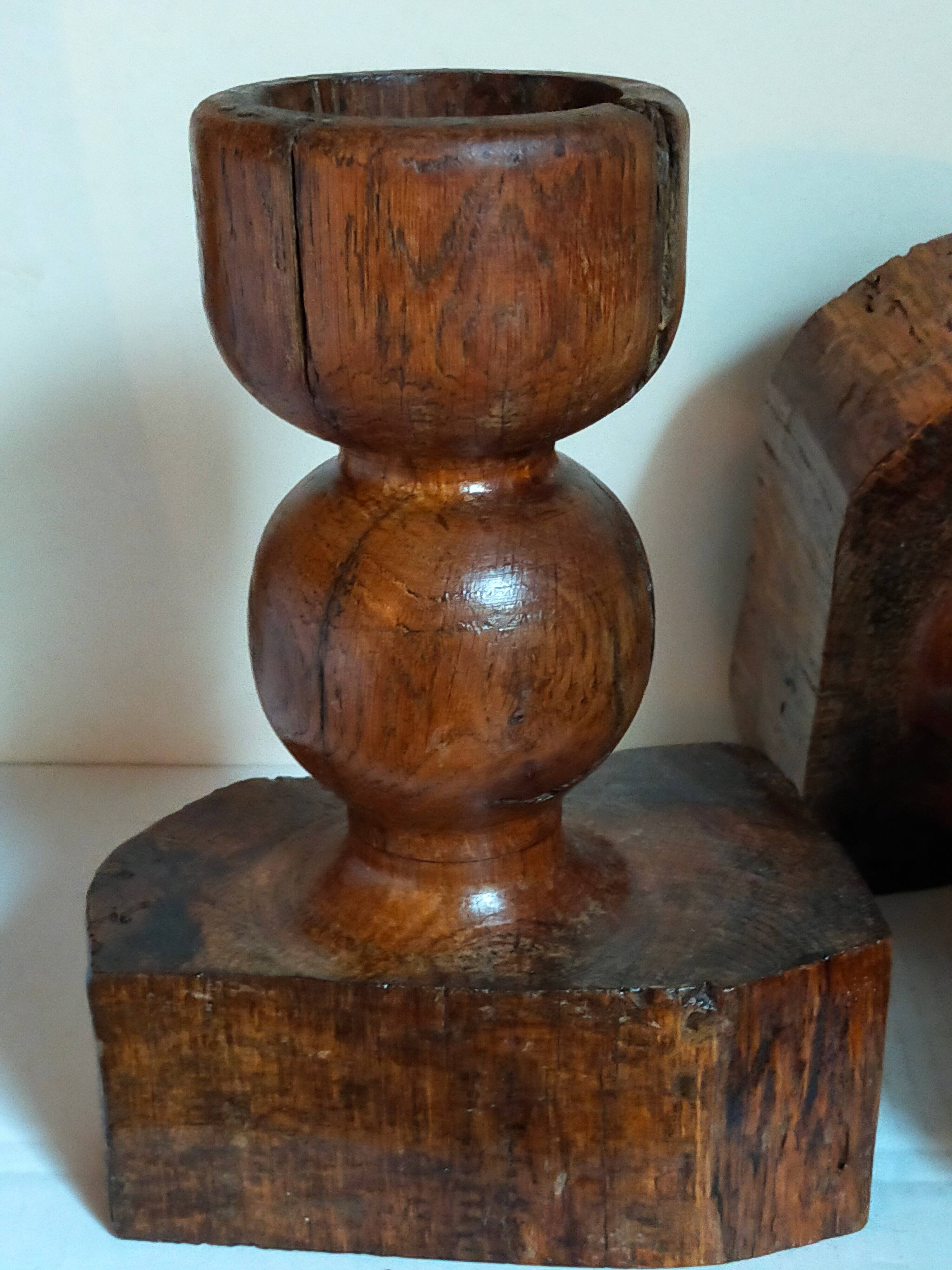 Pair of old brutalist turned solid wood candlesticks