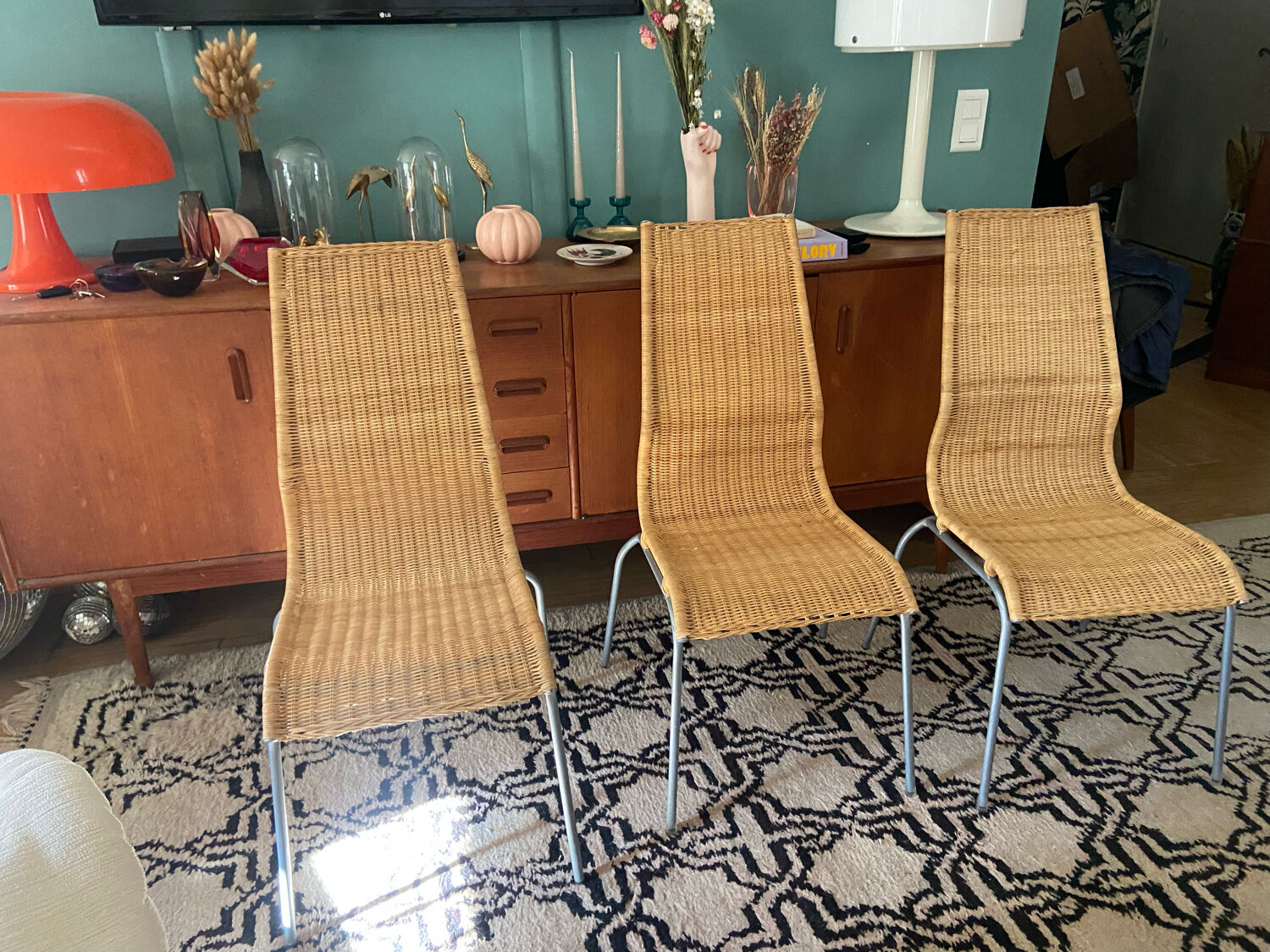 Trio of vintage Ikea rattan and aluminum chairs