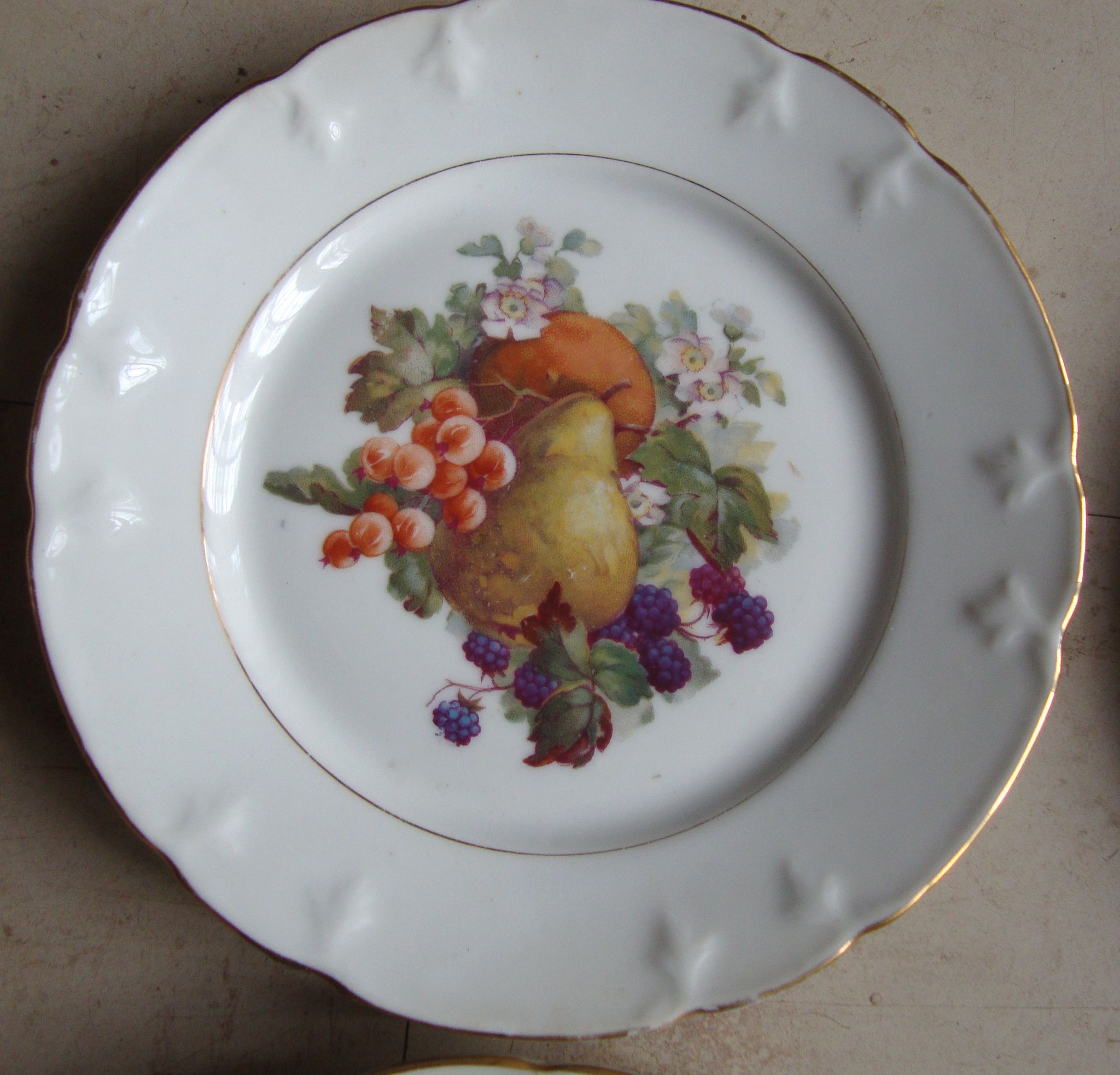 Set of 5 antique Limoges porcelain plates L.J.V with fruit decoration