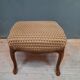 Pouf upholstered legs cambered in mahogany