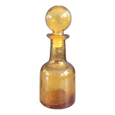 Carafe en verre moulé ambré avec bouchon
