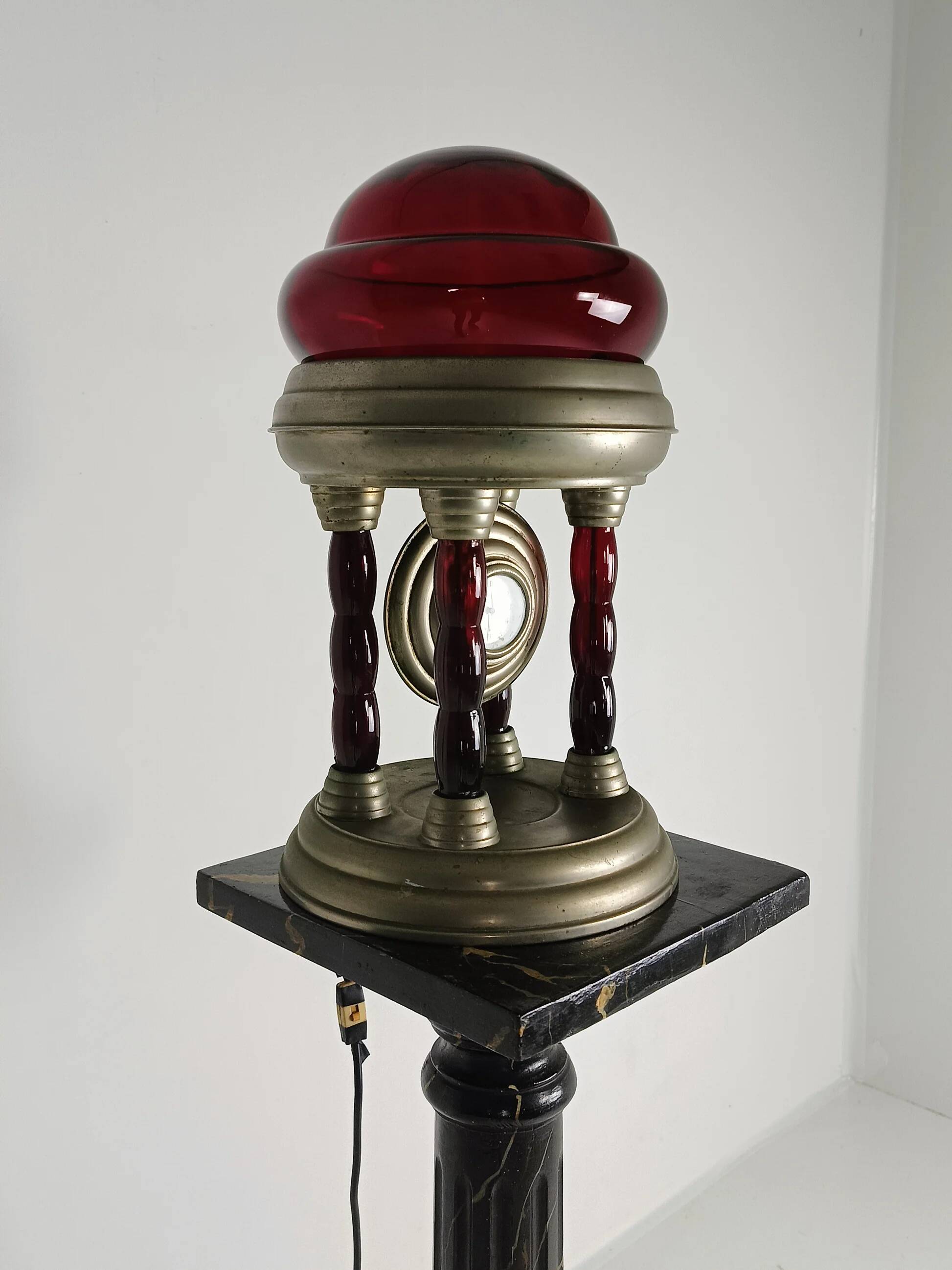 Unique vintage tin lamp with clockwork