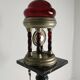 Unique vintage tin lamp with clockwork