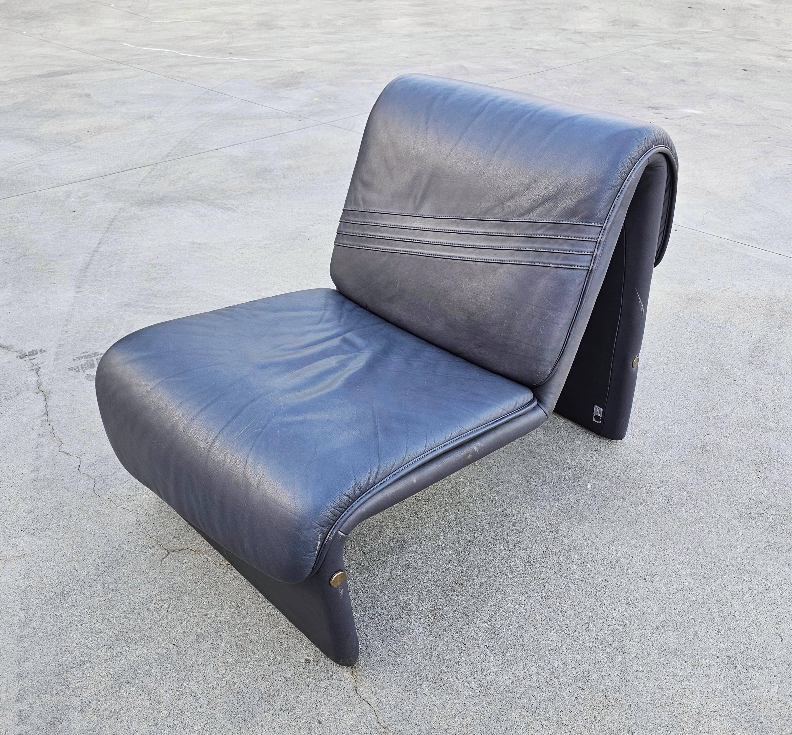 Postmodern leather lounge chairs in the style of Etienne Fermigier 1978.