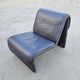 Postmodern leather lounge chairs in the style of Etienne Fermigier 1978.
