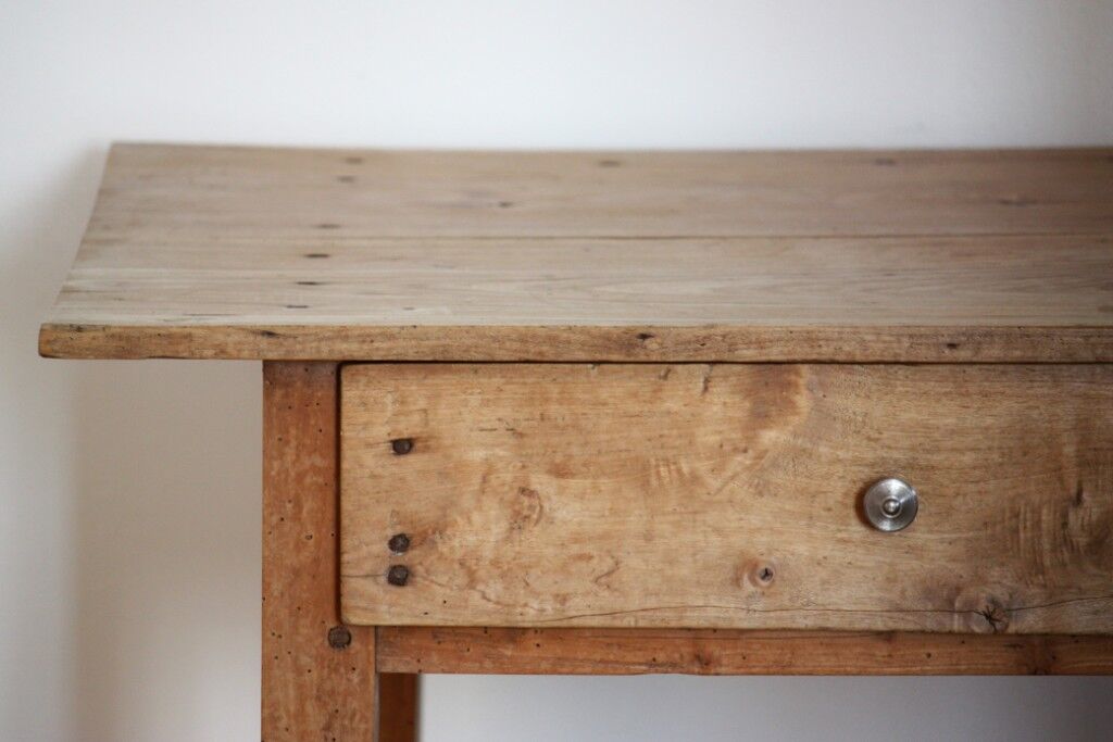 Wooden table with drawer