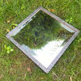 Art Deco mirror in chiseled wrought iron with beveled glass
