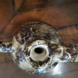 Spotted ceramic pitcher
