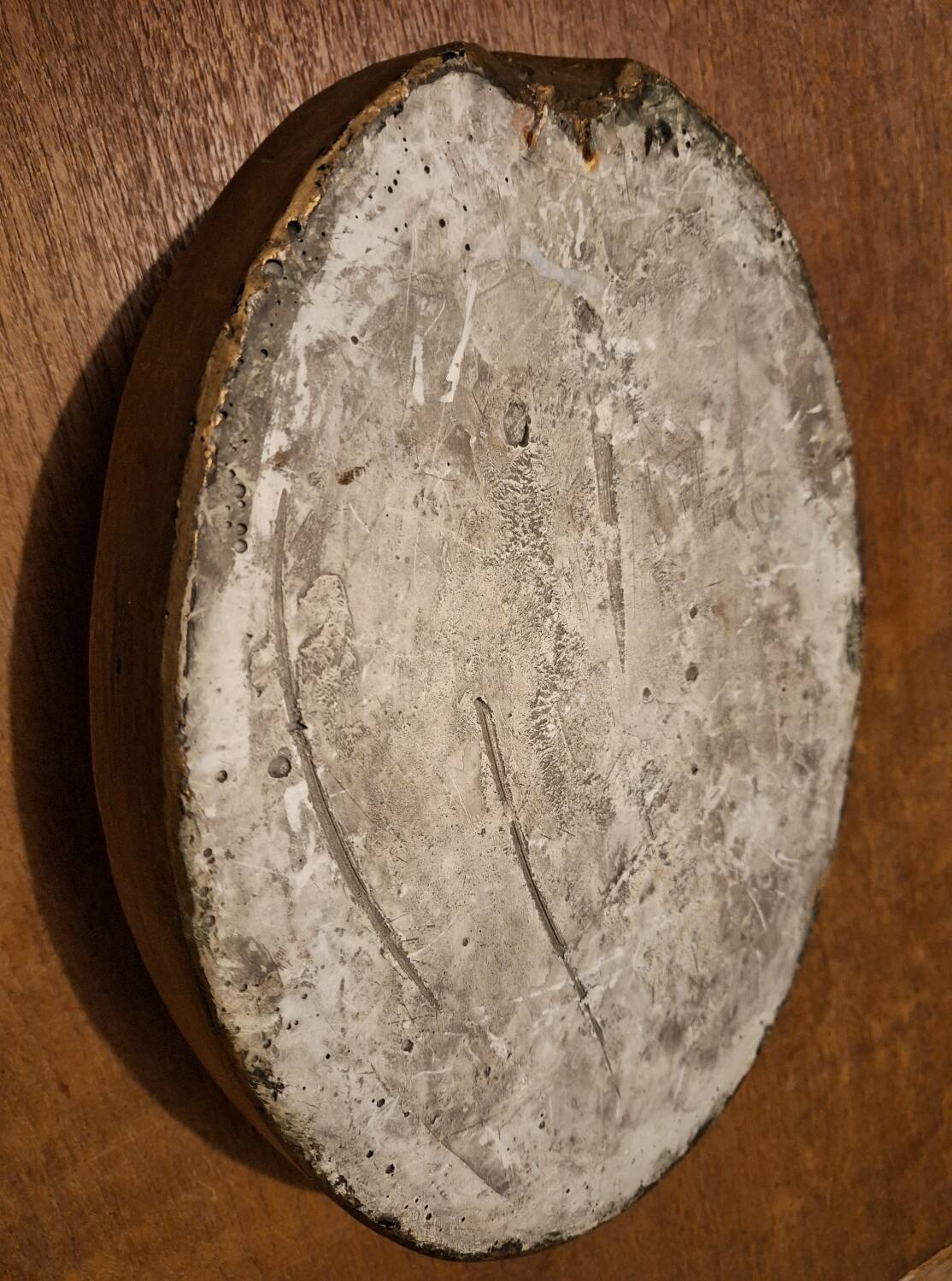 Vintage plaster frame of the Virgin, old religious painting