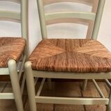Pair of green straw sitting chairs