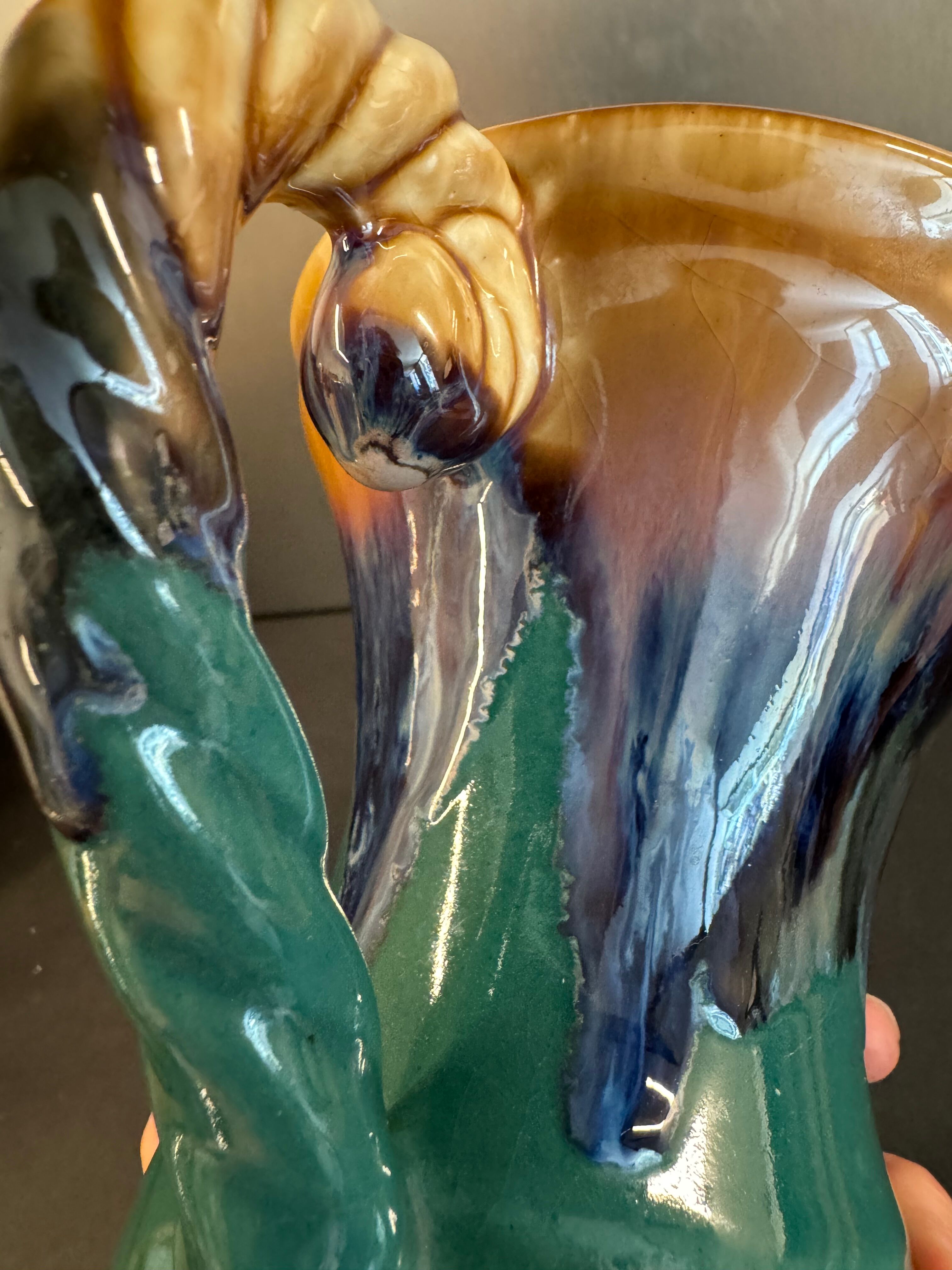 Flamed stoneware pitcher signed Alpho, no. 114