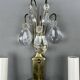 Pair of brass and crystal wall lights, 20th Century