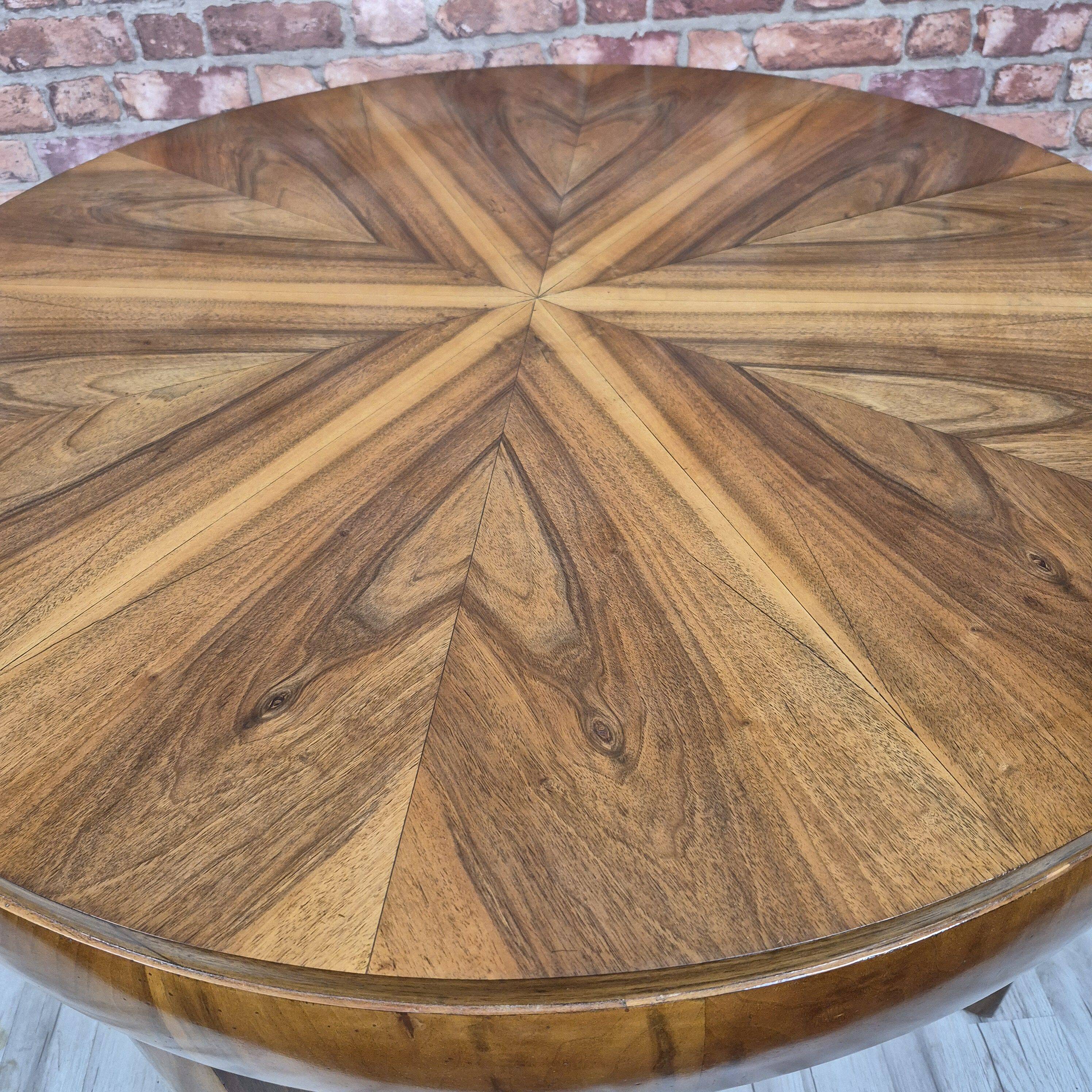 Walnut extendable round table after professional restoration. Art deco.