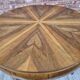 Walnut extendable round table after professional restoration. Art deco.