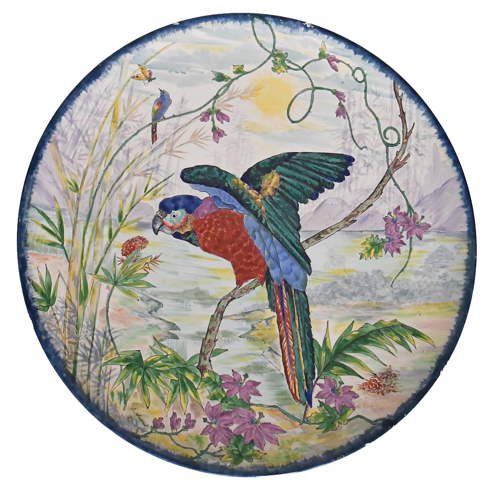 Large earthenware dish decorated with a parrot.