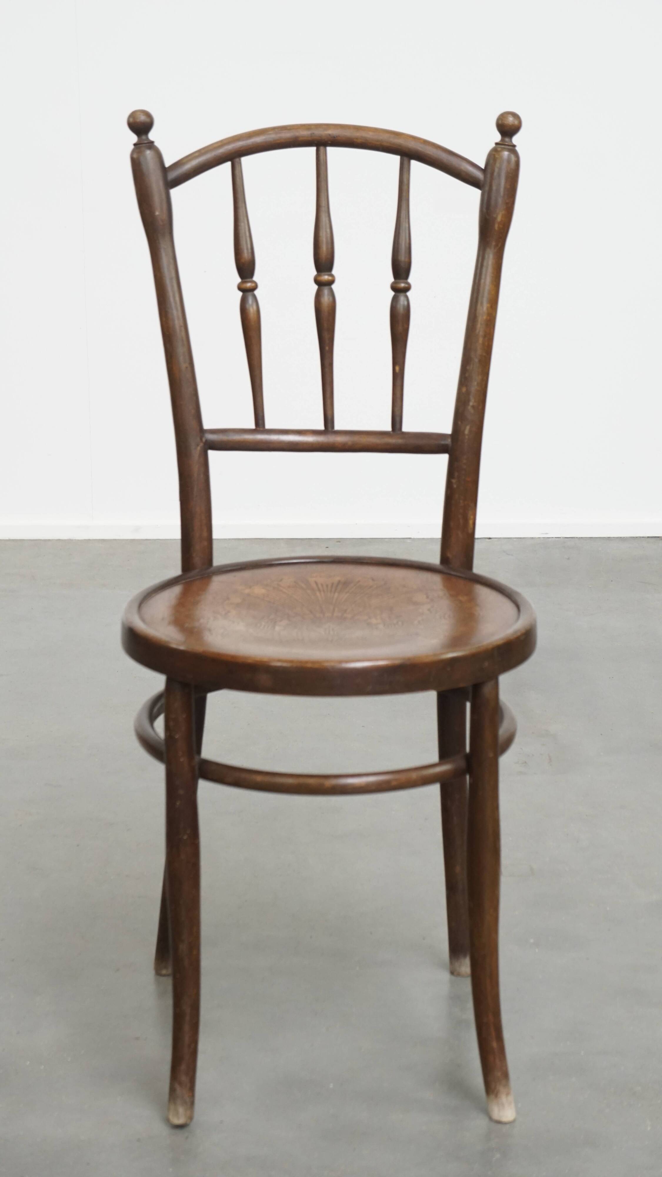 Bistro chair with carved seat
