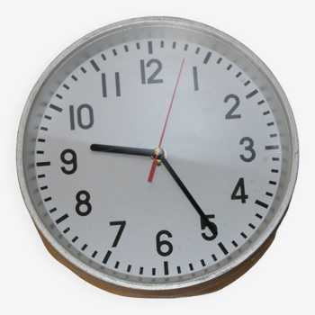 Round steel factory clock