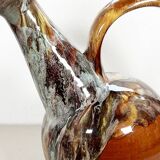 Large bird jug with high neck and handle, signed under the base