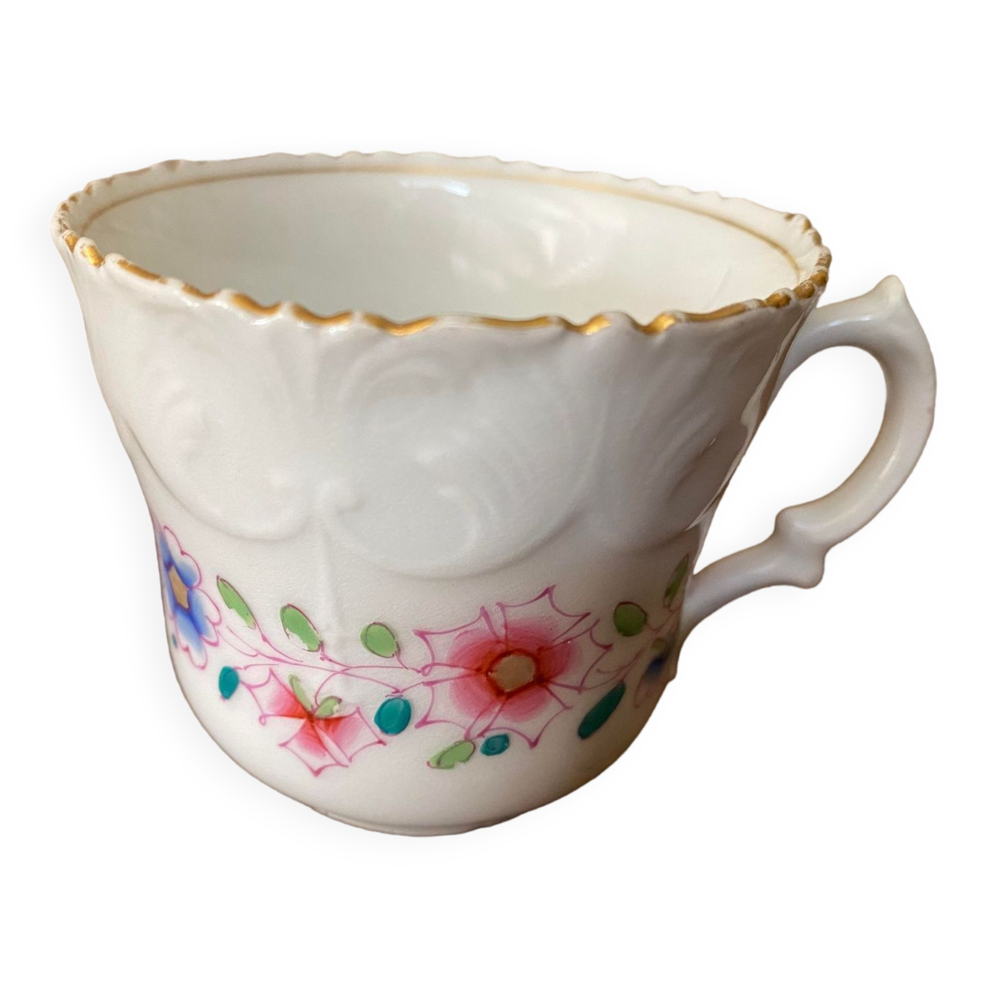 Porcelain cup with chiseled and gilded rim