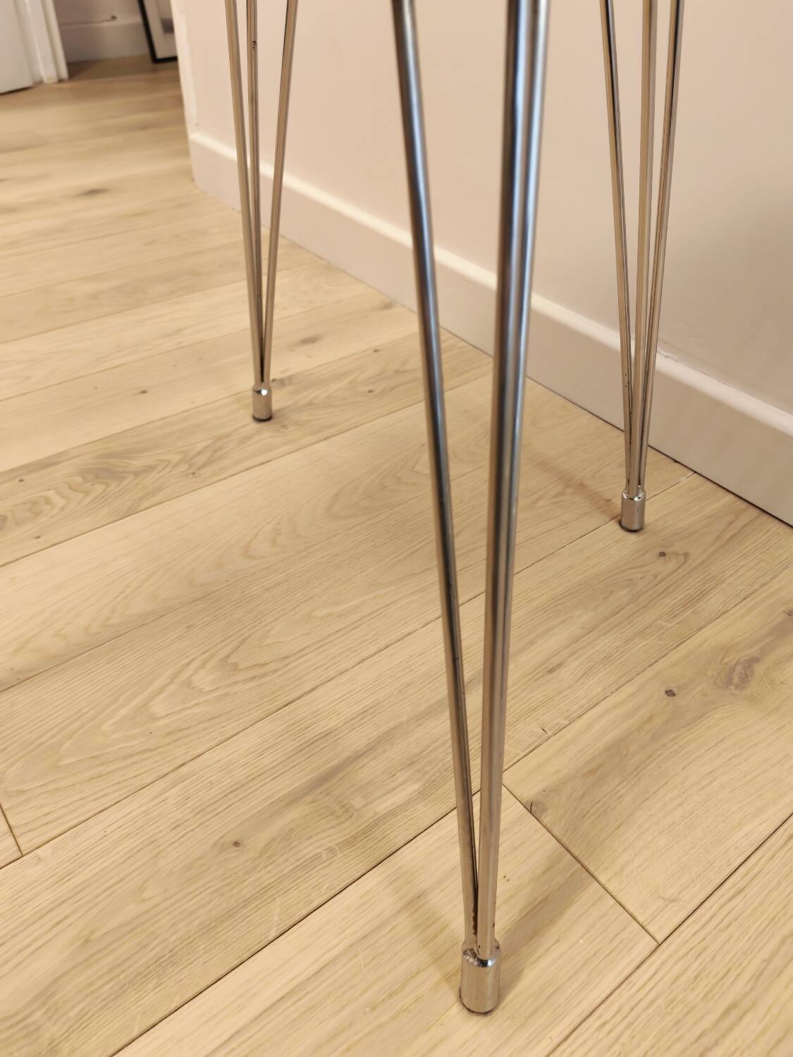 Pair of green Formica chairs with Eiffel legs