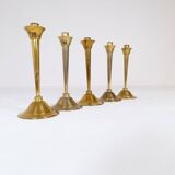 Mid-century set of 5 brass candlesticks by Lars Holmström, Arvika, Sweden.