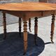 Extendable round table (with extensions and flaps), cherry wood.