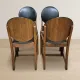 Set of four vintage wooden dining chairs with black leather upholstery, 85 × 45 × 45 cm