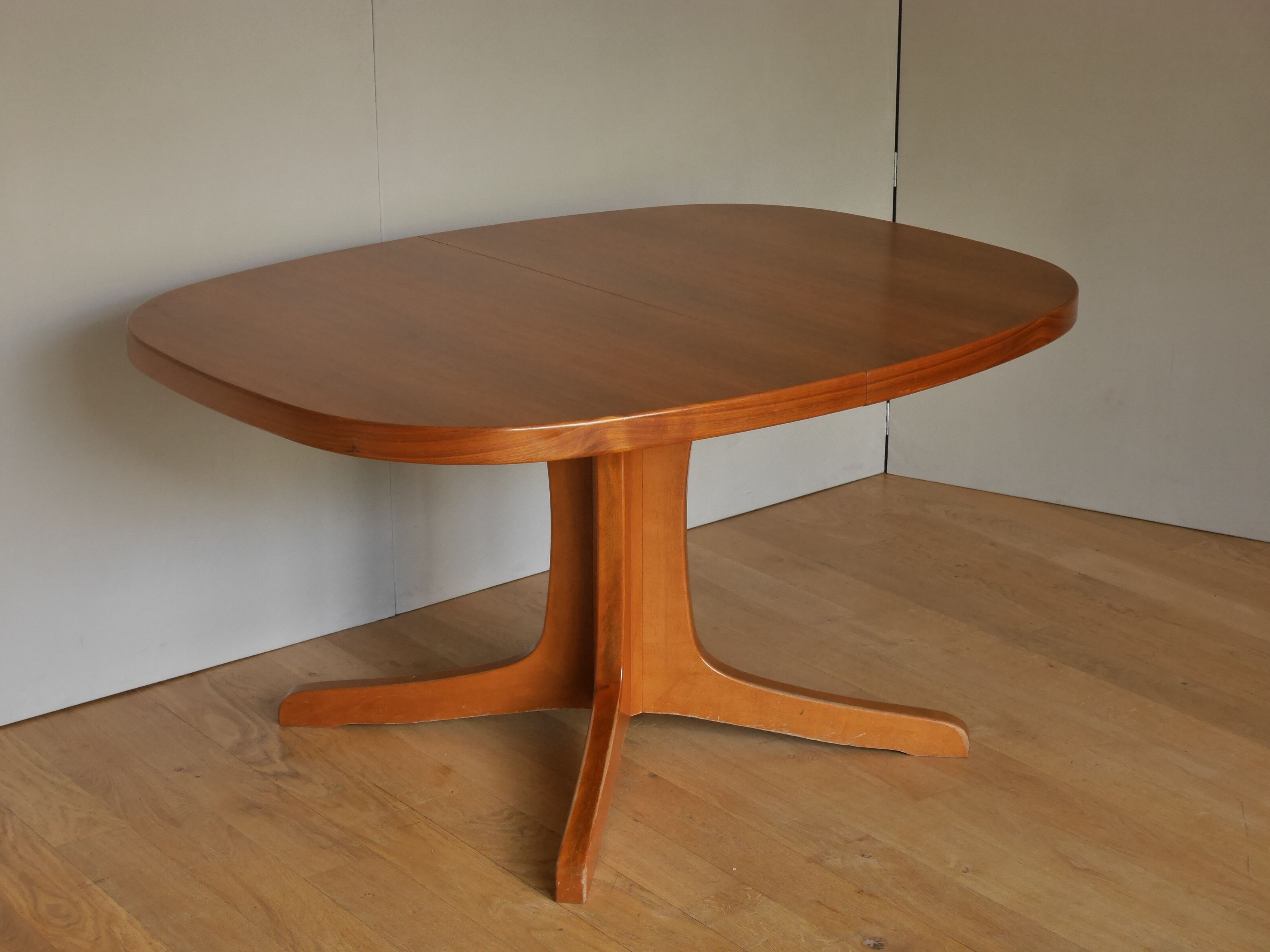 Baumann oval walnut table with extension cords