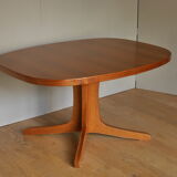 Baumann oval walnut table with extension cords