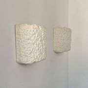 Pair of vintage wall lights in smooth plaster and stone imitation, France, 1970.