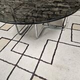 Round chrome coffee table with smoked glass