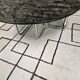 Round chrome coffee table with smoked glass