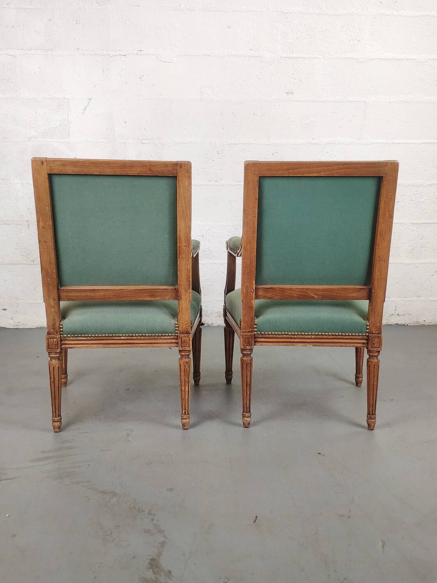 Pair of Louis XVI armchairs upholstered green velvet