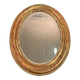 Golden oval mirror