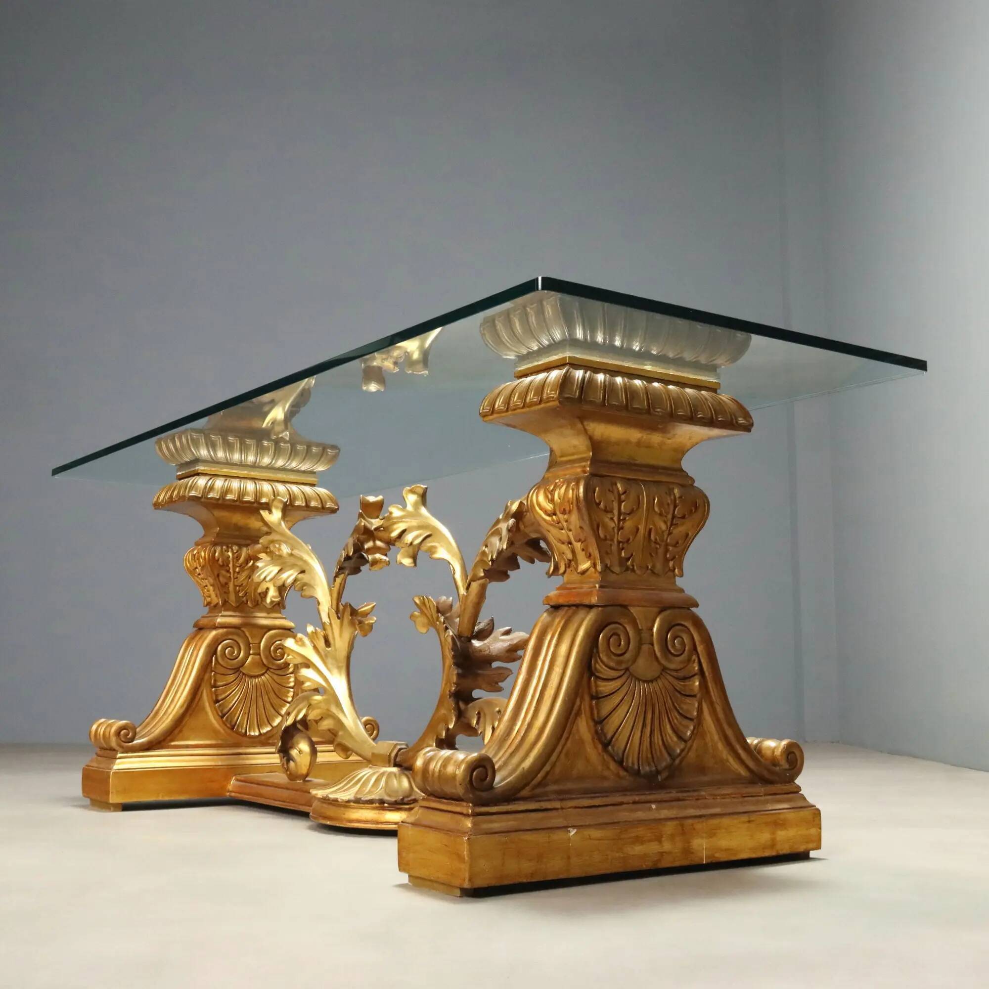 Antique coffee table in gilded wood with a glass top, Italy, 20th century.