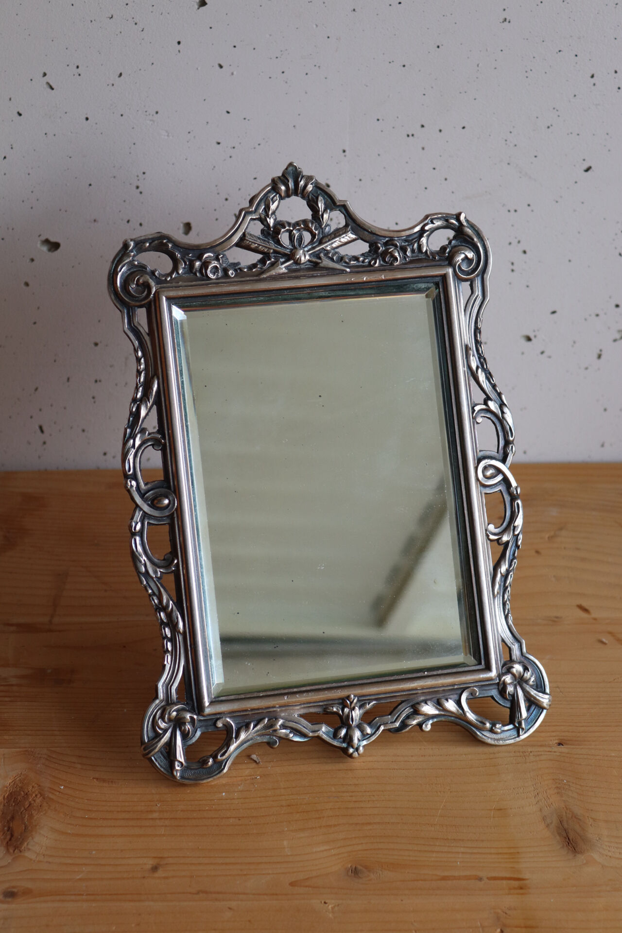 Small antique table mirror in Louis XVI style, silver-plated metal.
