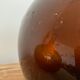 Old amber demijohn
