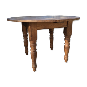Old round table in solid pine