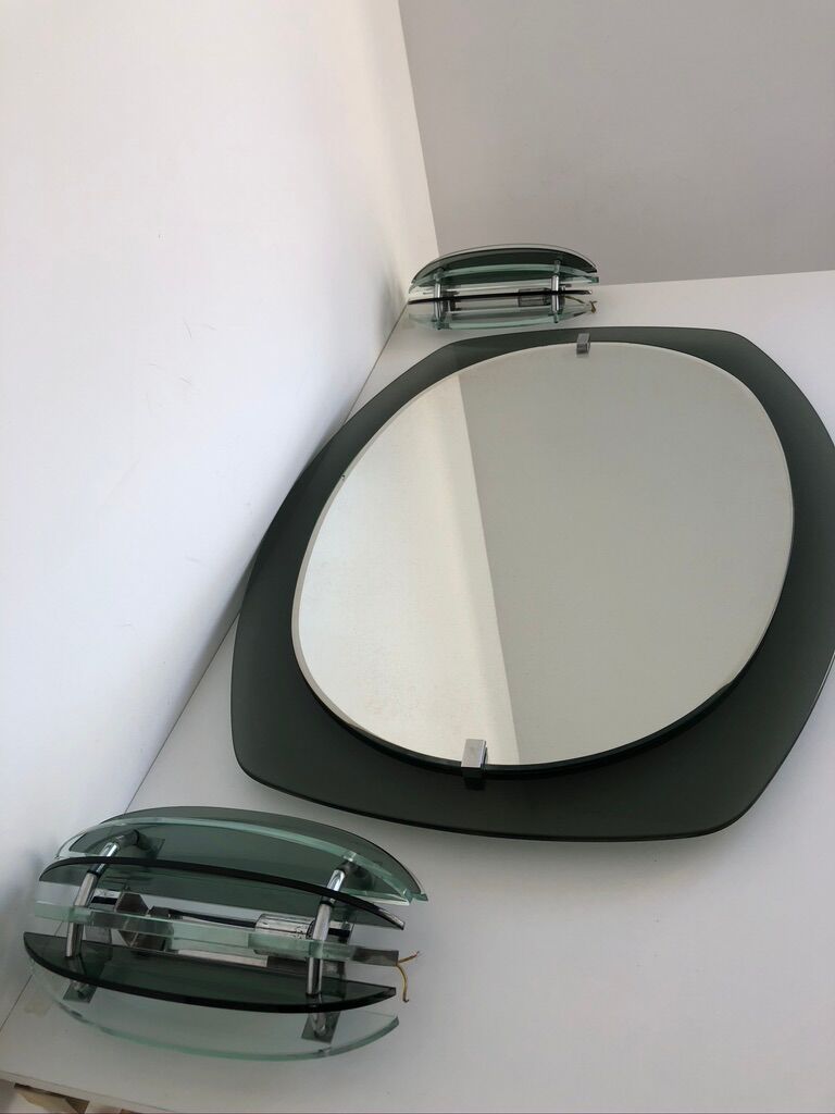 Veca mirror and 2 matching Veca wall lights made in Italy.