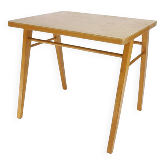 Small desk with compass feet