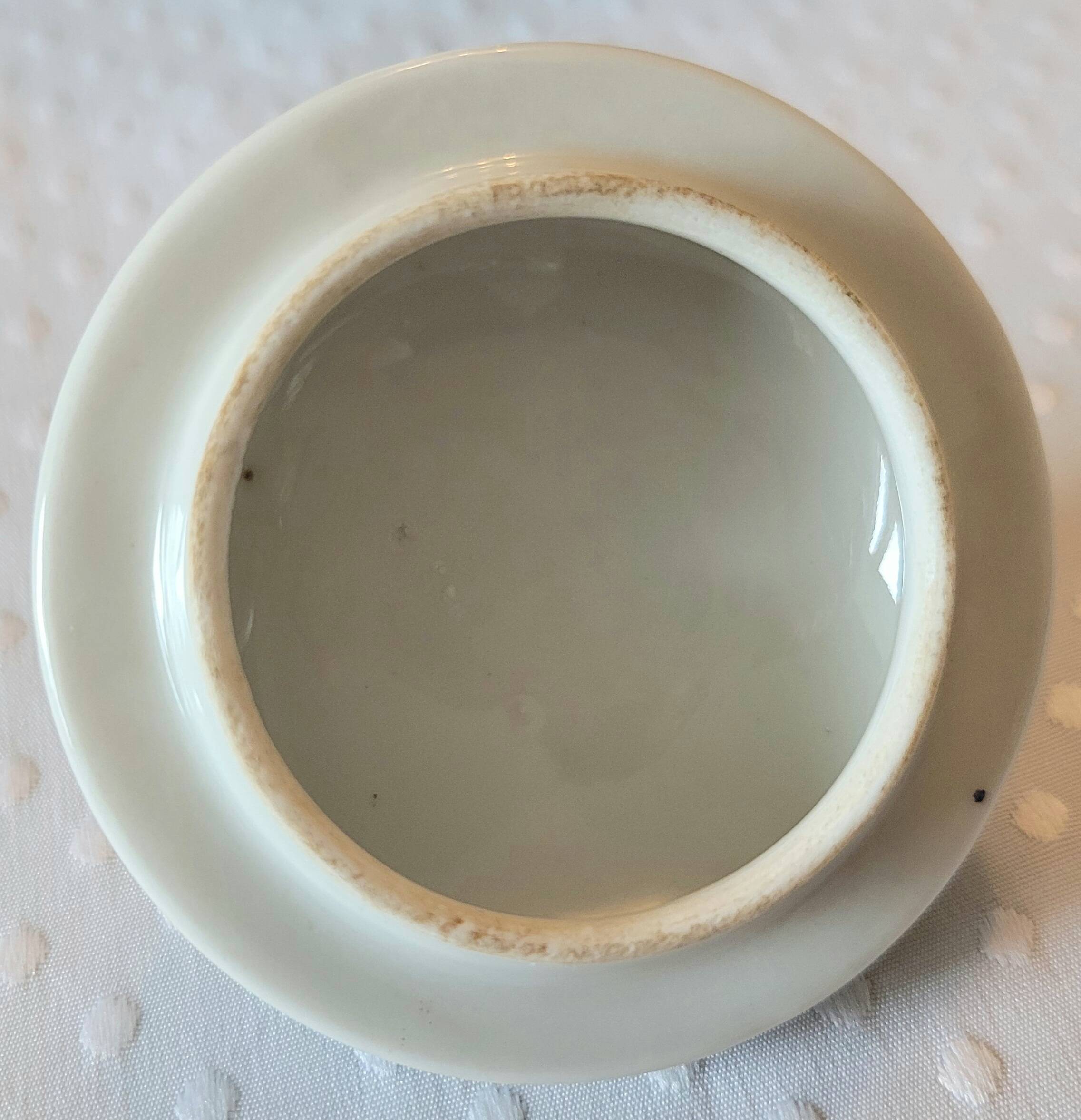 Blue and white ceramic coffee service with flowers.