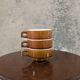 Trio of brown stoneware cups