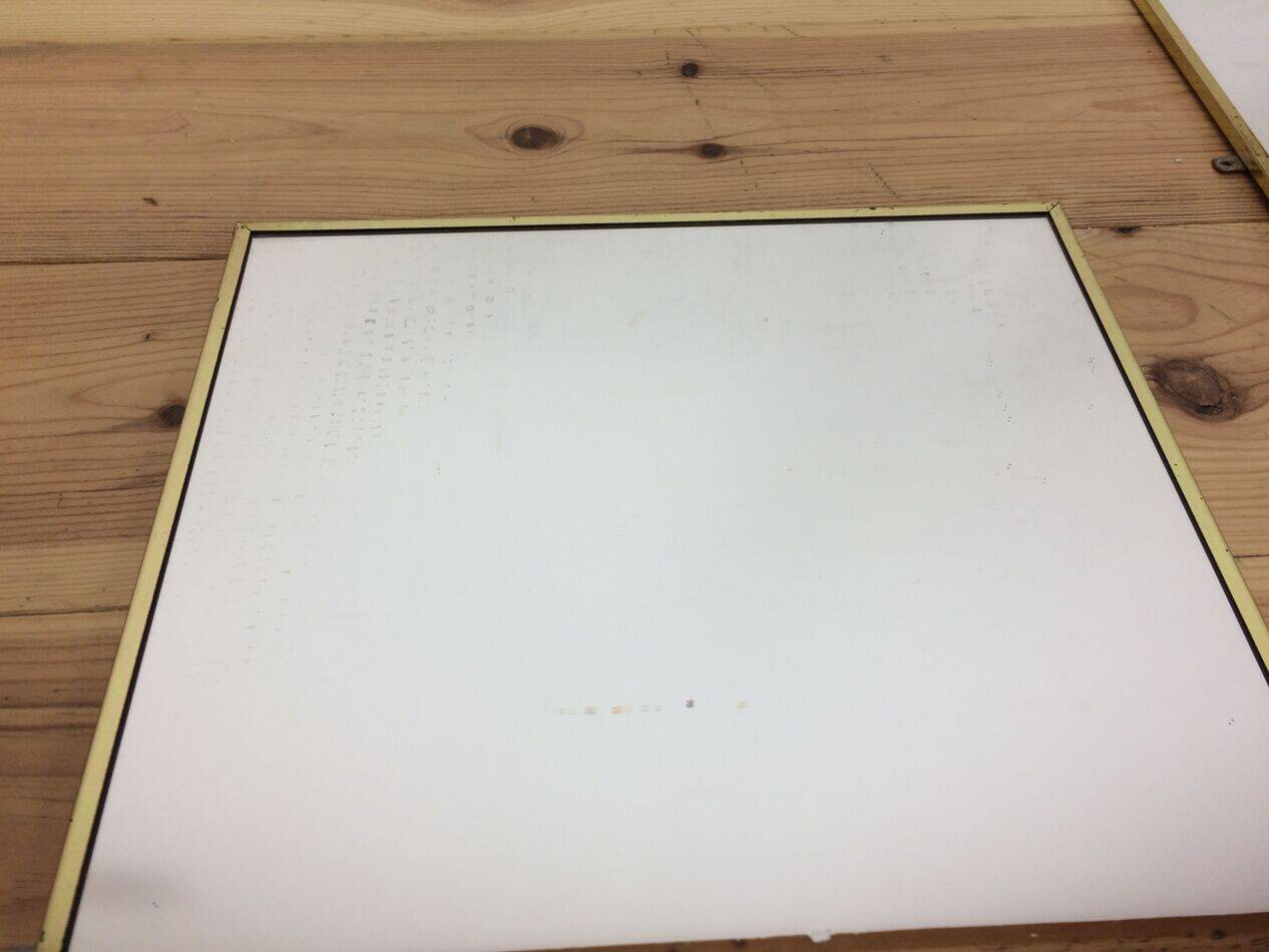 Paire de miroirs dorés 70's , 120 cm