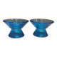 Two small candle holders in blue glass from the well-known Finnish company Ittala.