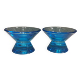 Two small candle holders in blue glass from the well-known Finnish company Ittala.