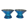 Deux petits bougeoirs en verre bleu de la célèbre société finlandaise Ittala.
