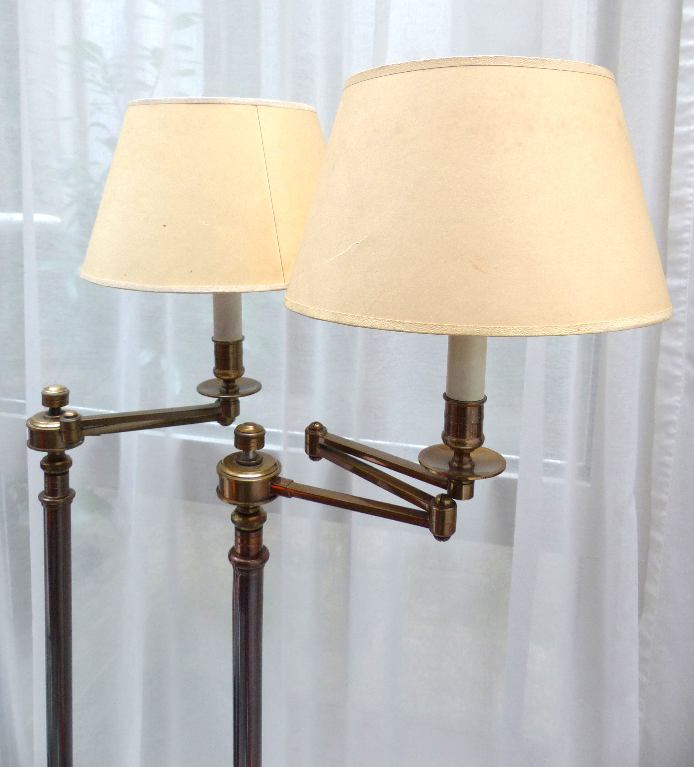 Pair of vintage e-readers with articulated arms